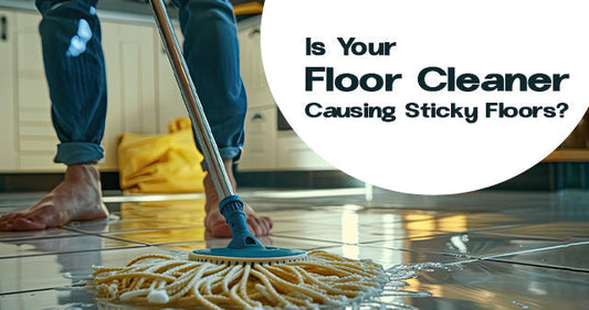 Person mopping tile floor with sticky residue caused by floor cleaner buildup