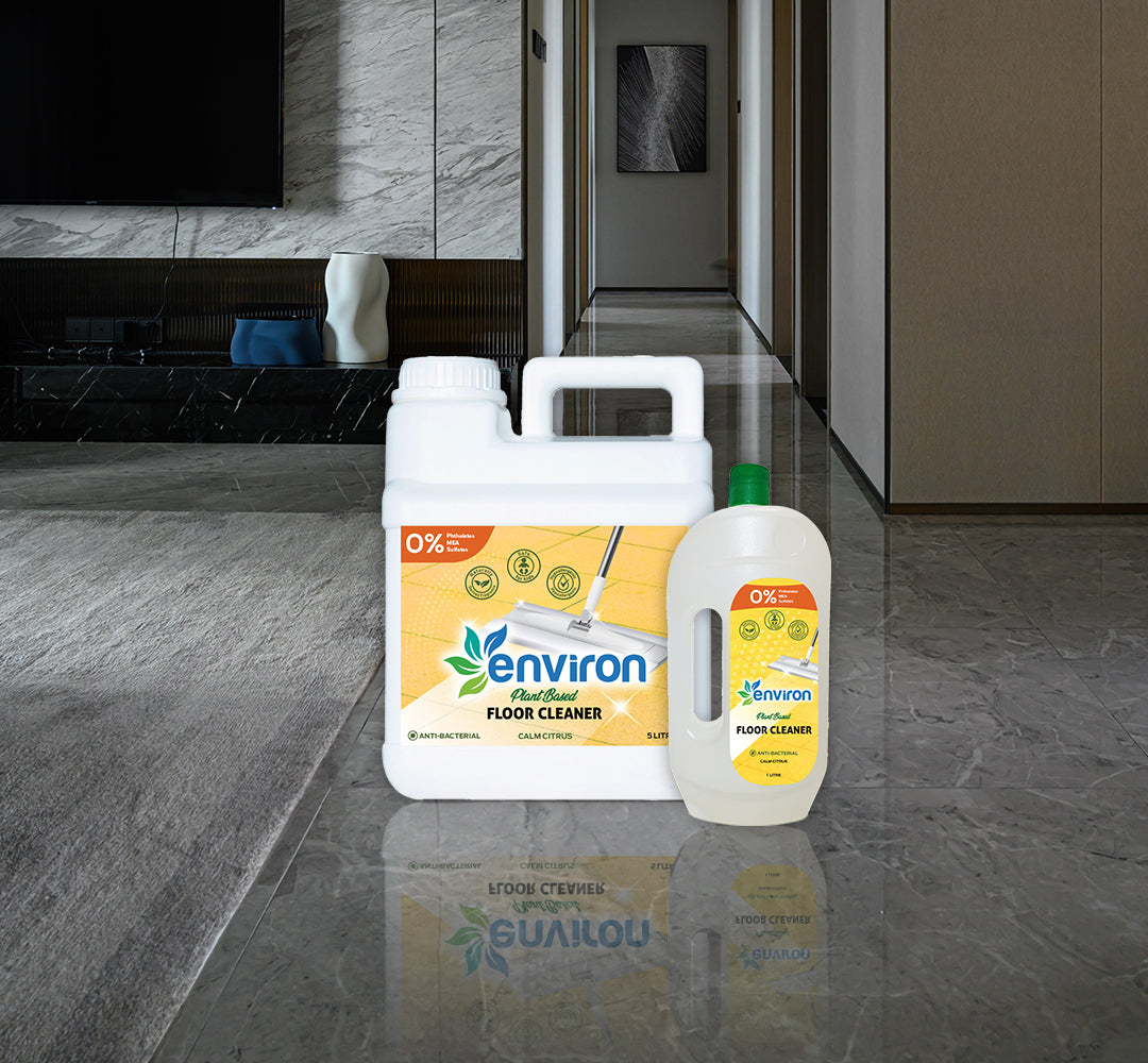 5L and 1L floor cleaner bottles on a shiny clean marble floor